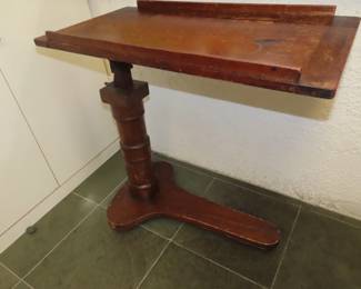 Antique rolling bed table.