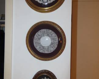 Three framed Batenburg lace doilies.