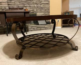 Second angle of wood, stone, and burnished metal coffee table