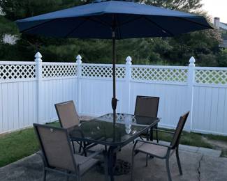 Second view of patio table with umbrella opened