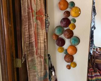 Another fantastic poncho and iron wall art