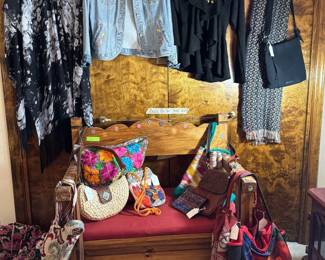 Great Mexican bench that opens for blankets lots and lots of bags and coats and ponchos