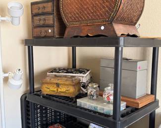 Shelf is packed with sewing items