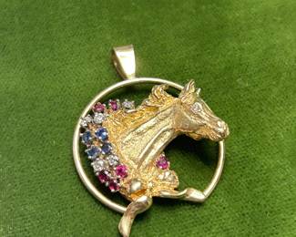 14Kt with rubies, sapphires, and diamonds 