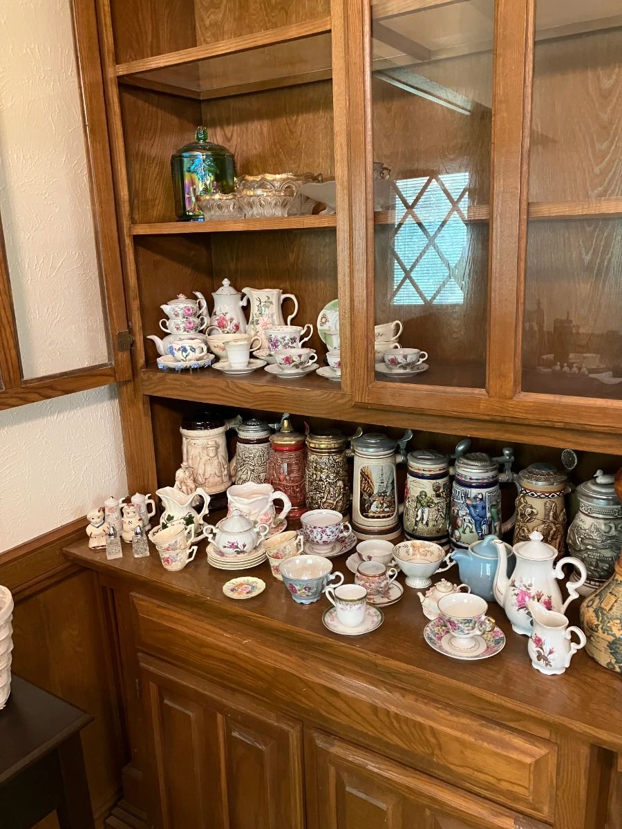 Look at these pictures! A home and separate shed/garage, both PACKED with treasures!