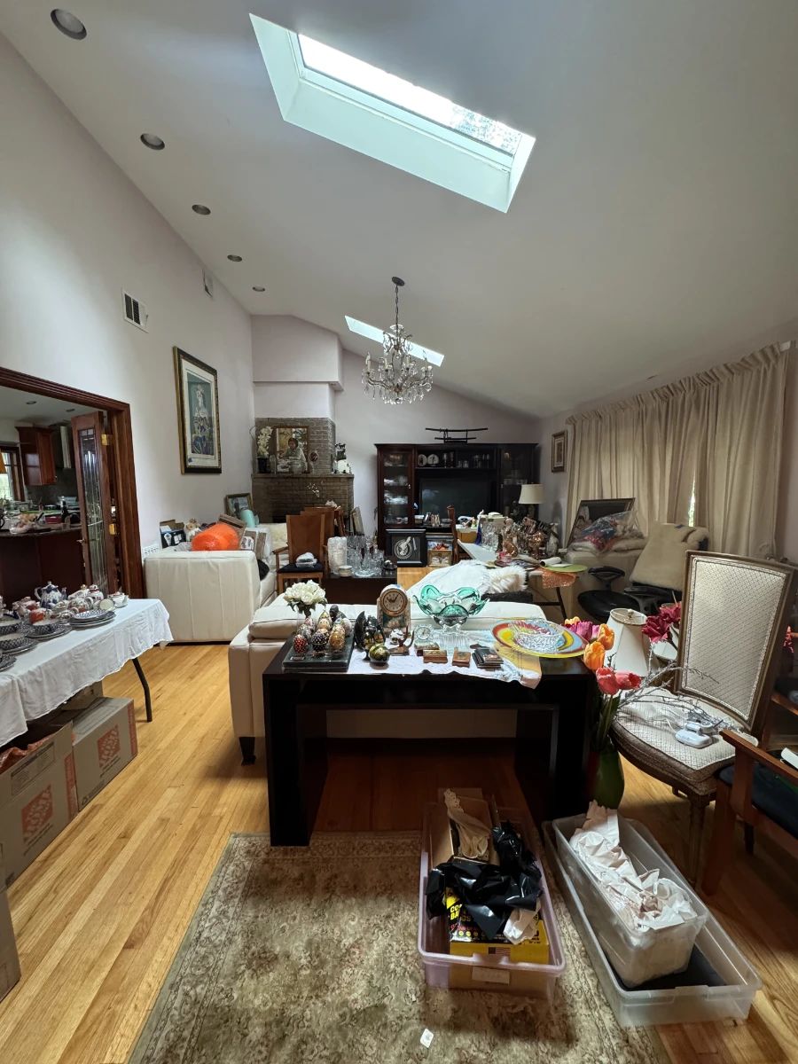 Main living room, upon entrance. We are working on moving things around. This room will hold the most valuable items.