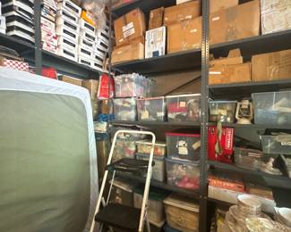 Still unwrapping boxes of 2000s children's boutique items, children's clothing, and women's shoes