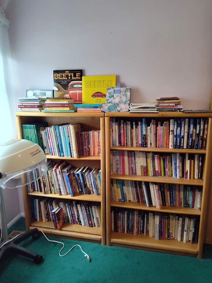 Books and bookcases; mostly Christian genre and gardening