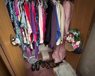 Closets full of nice ladies clothing
