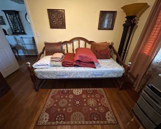 Daybed with Sealy mattress.
