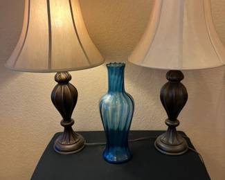 Two Metal Bronze Colored Table Lamps And A Pretty Blue Biase