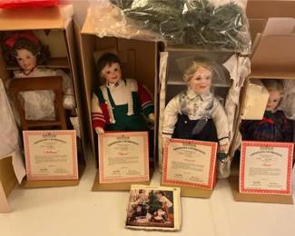 Four Collectible Dolls