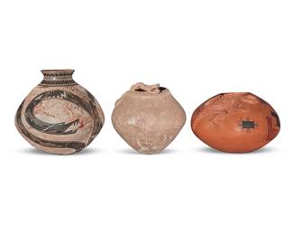 62 Three Mata Ortiz pottery reptile decorated jars Three works:  Celia López (b. 20th century) A polychrome pottery lizard effigy jar, late 20th century Incised to underside: Celia López With sculpted lizard in relief and black and red geometric motifs on a red slip ground 5.375" H x 7.625" Dia.  Rito Talavera Quezada (b. 20th century) A snake effigy pottery jar, 1995 With incised signature and date: Rito Talavera With snake figure in relief above a marbled cream slip 6.375" H x 6.75" W x 6.375" D  Eduardo Quintana Rodriguez (b. 20th century) A sgraffito pottery olla, late 20th century Incised signature to underside: Eduardo Quintana Ro With black geometric and snake motif on a marbled red/cream slip ground 7.5" H x 7.375" Dia.  3 pieces Estimate: $300 - $500