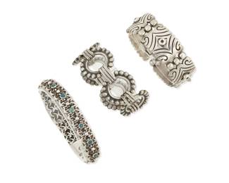 273 Hector Aguilar (1905-1986, Mexican) Three Mexican silver bracelets Circa 1940-1945, 1943- 1948, 1948-1962; Taxco, Mexico Each stamped: HA [conjoined]; further variously stamped: .940 / Taxco / Mexico / [Eagle 9] / Sterling / Made in Mexico Three works in sterling silver comprising a chunky incised silver link bracelet with stacked silver balls (6.5" L x 0.875" H), a bracelet with openwork circle links with silver ball edging (7" L x 1" H), and a diminutive chain bracelet with set turquoise-colored stones (7.25" L x 0.5" H) 3 pieces 151.2 grams gross Estimate: $800 - $1,200