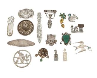 291 A group of Mexican-style silver jewelry Mid/late-20th century Eleven variously marked for sterling; ten marked for Mexico; one marked for Guatemala Comprising eleven brooches in various sizes and motifs, including hats, masks, landscapes, a carved greenstone mask, a squirrel, a concho, and a bird brooch, as well as two narrow Aztec/Maya style pendants, a chased silver hair barrette clip, a bookmark, and a letter opener 16 pieces Largest: 2.875" H x 2" W; Smallest: 1.5" H x 0.625" W; Barrette: 1.125" H x 3.75" W; Opener: 5' H x 0.75" W 198.9 grams gross Estimate: $200 - $300