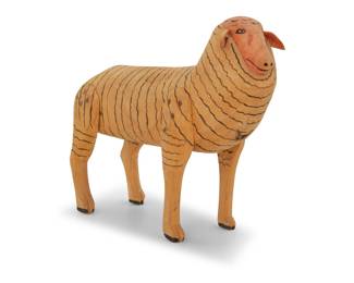 219 Manuel Jiménez Ramírez (1919-2005, Mexican) A polychrome carved copal wood sheep alebrije, mid/late 20th century; Oaxaca, Mexico Unmarked 8.5" H x 11.75" W x 3.625" D Estimate: $400 - $600
