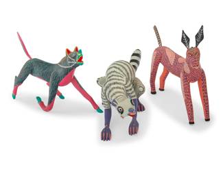 238 Three Mexican polychrome wood alebrijes Late 20th/early 21st century; Oaxaca, Mexico The pink signed and inscribed: Rodrigo. M. O; the skunk: JOSE LUIS SANTIAGO / ARRAZOLA; the green: Alfonso Fabian Mendoza / Sn Martin Tilcajete. Ocotlan. Oax / Av. Hidalgo #42 Comprising three vibrantly painted folk art spirit figures including a Zorrillo de Madera (skunk) 3 pieces Skunk: 6.125" H x 17.375" W x 5.75" D; Tallest: 9.5" H x 14.375" W x 4.5" D Estimate: $200 - $400