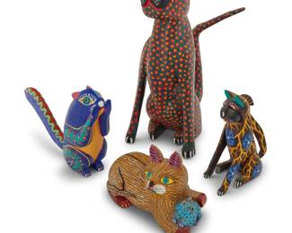 240 Four Mexican polychrome wood alebrijes Late 20th/early 21st century; Oaxaca, Mexico Tallest signed and inscribed: Pedro Hernandez Cruz / Tilcajete / OAX MEX; squirrel: Delfino Gutiérrez M / Sn Martin Tilcajete / Oaxáca; seated: FRANCISCO MELCHOR / SAN MARTIN TILCAJETE / OAX MEX; group: Pedro Ramírez / Arrazola Xoxo / Oaxaca The vibrantly painted folk art figures, comprising two cats, a cat figural group, and a squirrel 4 pieces Largest cat with tail: 13.75" H x 10.75" W x 7" D; Group: 4.9875" H x 7.25" W x 3.625" D Estimate: $200 - $400