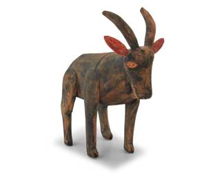 221 Manuel Jiménez Ramírez (1919-2005, Mexican) A polychrome carved copal wood goat alebrije, mid/late 20th century; Oaxaca, Mexico Unmarked 5.875" H x 6.875" W x 2.375" D Estimate: $300 - $500