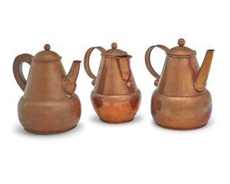 256 Three Héctor Aguilar copper pots Héctor Aguilar (1905-1986, Mexican) Circa 1939-1948; Taxco, Mexico Each impressed to underside: HA [conjoined] / TAXCO / MEXICO Comprising a teapot with wood handle, a coffee pot, and a water pitcher 3 pieces Tallest: 8.375" H x 8.125" W x 5.75" D; Shortest: 7.75" H x 7" W x 5" D Estimate: $400 - $600