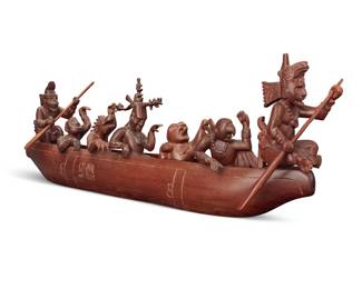 73 Anibal Arivalo (20th Century, Guatemalan) A Mayan-style carved wood xibalba canoe, late 20th/early 21st century Unmarked Depicting seven figures in funerary canoe 8.75" H x 24.25" L x 4.25" W Estimate: $400 - $600
