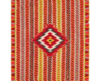 42 A Mexican Aggregate Period sarape Late 19th century Woven with wool weft on a cotton warp, with multicolored vertical serrated columns and a concentric-style diamond to center, with multicolored striped banding and and blanket stitch to ends 82.5" H x 56" approximately Estimate: $800 - $1,200