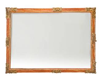 255 A Spanish Colonial Baroque-style mirror 18th/19th century The updated beveled mirror within a painted frame with parcel-gilt carved scroll and foliate elements 52.5" H x 73" W x 2.375" D Estimate: $800 - $1,200