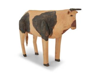 218 Manuel Jiménez Ramírez (1919-2005, Mexican) A polychrome carved copal wood cow alebrije, mid/late 20th century; Oaxaca, Mexico Unmarked 8.25" H x 13" W x 3.625" D Estimate: $400 - $600