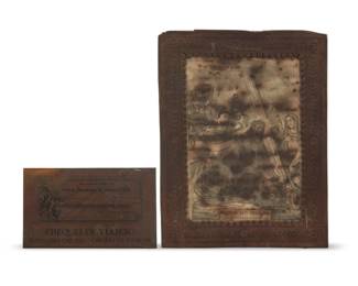 165 Two Mexican metal items Late 19th/early 20th century Comprising a framed print on paper inscribed "El Sr. De Los Trabajos" under glass within a repoussé cut iron frame, and an engraved brass sample plate/sign depicting a Banco National Mexico Travelers Check, inscribed "Cheques de Viajero" 2 pieces Sight of print: 9.375" H x 6.5" W; Framed: 12.5" H x 9.75" W; Check: 4.75" H x 7.75" W Estimate: $150 - $250