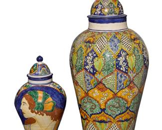179 Two Mexican Talavera pottery jars Mid/late 20th century Smaller signed to underside: TALAVERA / VENEGAS / MEX; larger unmarked The enameled earthenware lidded jars each decorated with floral and foliate motifs, comprising one monumental and one smaller depicting two profile busts of ladies 2 pieces Monumental: 49" H x 24.75" Dia.; Smaller: 27.75" H x 16" Dia. Estimate: $600 - $800