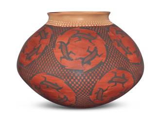 75 Lupe Soto (b. 20th Century, Mata Ortiz) A large polychrome pottery olla, late 20th/early 21st century Incised to underside: LUPE SOTO With corrugation to neck above black on red lizard motifs within a checkered matrix 10.125" H x 13.75" Dia. Estimate: $200 - $400