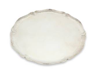 6 A Peruvian hammered sterling silver tray Mid-20th century Impressed to underside: RLL / PL [indecipherable] / 925 / AMAND / Industria Peruana The round serving platter with a lobed rim 14.25" Dia. 35.5 oz. troy approximately Estimate: $1,800 - $2,200