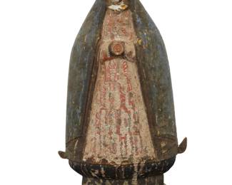 16 A Spanish Colonial polychrome carved wood santo bulto 19th century Depicting Our Lady of Guadalupe 13.75" H x 7" W x 4" D Estimate: $300 - $500