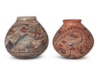 83 Two Mata Ortiz polychrome marbled pottery ollas Late 20th century One incised to underside: TITO ENRIQUEZ; the other signed and dated: Rodrigo Perez / 99 Comprising one by Tito Enriquez (b. 1950) and one by Rodrigo Perez (b. 1976), each with red and black feather and geometric motifs on a marbled red/cream slip ground 2 pieces Taller: 6.875" H x 6.75" Dia.; Shorter: 6.125" H x 6.5" Dia. Estimate: $200 - $400