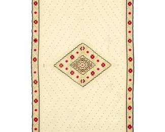 32 A Mexican Maximilian Period sarape Circa 1862-1865 Woven in white and multicolored floss wool in two panels seamed down the middle, with a central floral diamond medallion and a floral border, the field with alternating grey and black ticking scattered throughout 83" H x 46" W approximately Estimate: $3,000 - $5,000