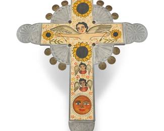 199 Marie Romero Cash (b. 1942, Hispanic) A painted wood and chased tin cross, 1994 Signed and dated verso: Marie Romero (cash) / 9/94 Depicting a winged figure flanked by sunflowers above two cherubs and a sun, mounted with repoussé mixed metal accents 30.25" H x 23" W x 1" D Estimate: $200 - $400