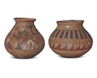 142 Two Casas Grandes-style polychrome pottery jars 20th century Each unmarked Comprising one four-color jar with geometric motifs and one red and black on cream slip with banded feather motifs 2 pieces Taller: 6.375" H x 6.375" Dia.; Shorter: 5.875" H x 7" Dia. Estimate: $100 - $200