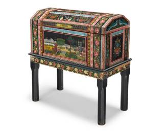 18 A Mexican Olinalá lacquered wood wedding chest 20th century; Guerrero, Mexico Inscribed in a cartouche at front: UN RECUERDO Lacquered wood with locking hinged lid, hand-painted floral elements and vignettes throughout, the largest scene at front depicting figures in a courtyard by a church, raised on a conforming and possibly later stand Chest: 13.5" H x 27.75" W x 13.5" D; Stand: 16.5" H x 29" W x 14.25" D; Overall: 30" H Estimate: $800 - $1,200