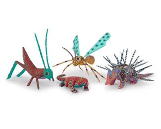 241 Four Mexican polychrome wood alebrijes Late 20th/early 21st century; Oaxaca, Mexico One signed and inscribed: Pedro Ramírez / Arrazola Xoxo / Oaxaca; the wasp: Medardo Blas; the cricket: Delfino Gutiérrez M / Sn Martin Tilcajete / Oaxáca; another: PEPE SANTIAGO The vibrantly painted folk art figures, comprising a cricket, wasp, porcupine, and a reptile 4 pieces Wasp: 9.75" H x 12" W x 11" D; Porcupine: 6.25" H x 14.25" W x 8" D; Lizard: 2" H x 7.75" W x 4" D Estimate: $200 - $400