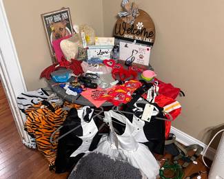 Dog stuff- Tiger costumes, bride dress, tuxedos x2, chiefs jersey, 2 red sweaters, nail trimmers x2, bandannas, rainbow dress, snuffle Matt’s, lick mat, harness, gentle leader, devil wings, hiking bowl