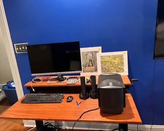 Manual sit-stand desk, speaker system, HP PC not pictured 