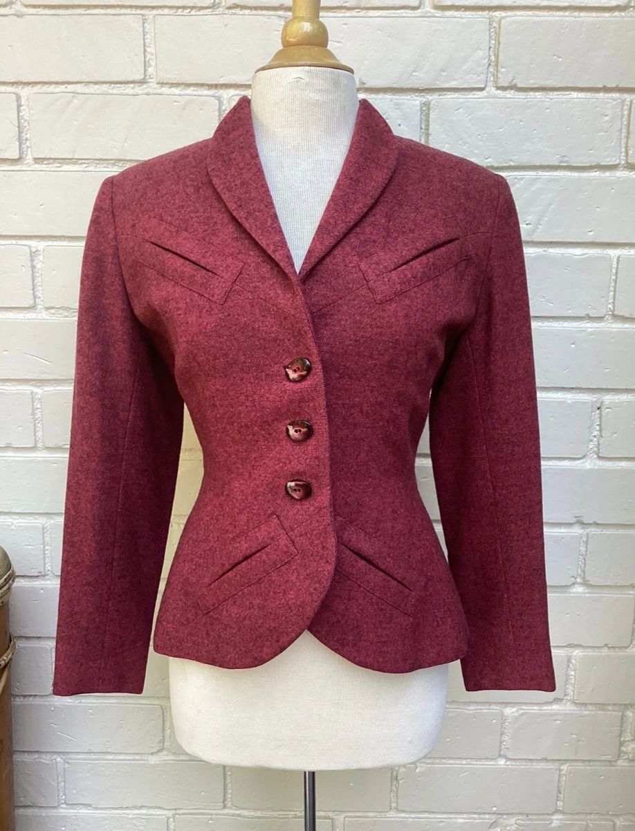 Vintage Tailored Wool Jacket  Classic vintage tailored blazer in a rich raspberry heathered wool blend with sculpted waist, elegant shawl collar, and decorative buttons. Sophisticated craftsmanship that pairs beautifully with trousers, skirts, or denim.