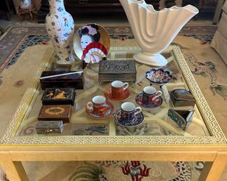 The white "fan" vase, Japanese plate and espresso set are sold.