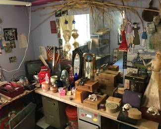 Miscellaneous knickknacks in the craft room, also includes a combo tv/vcr (as is) and small Coca-cola branded fridge.
