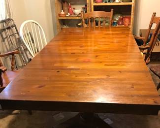 Dining table 88”x42” with leaf. Also includes two armchairs and four chairs. 