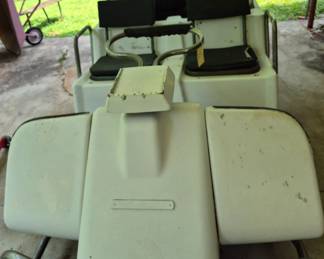 Vintage Harley-Davidson golf cart with black seata