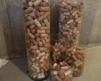 082 sixglasscylindersfullofwinecorksc