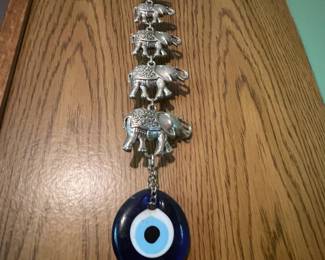 Eight Elephants & An EvilEye?