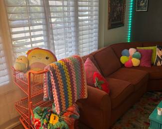 Cozy couch! Rug! Throw blankets! 