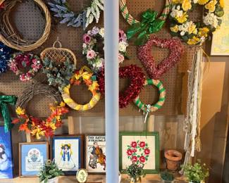 Large assortment of handcrafted wreaths, grapevine wreaths, seasonal wreaths, floral wreaths, Valentine's décor, spring, fall, Christmas, and unfinished wreath forms ready for decorating.